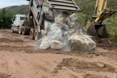 Rock being delivered for the berm repair in the Sanctuary of the Margaree river. (September 24, 2019)