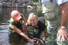 The smile says it all. Erin Gillis gets to hold her first Margaree salmon.