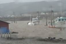 High water at wharf in Belle Cote